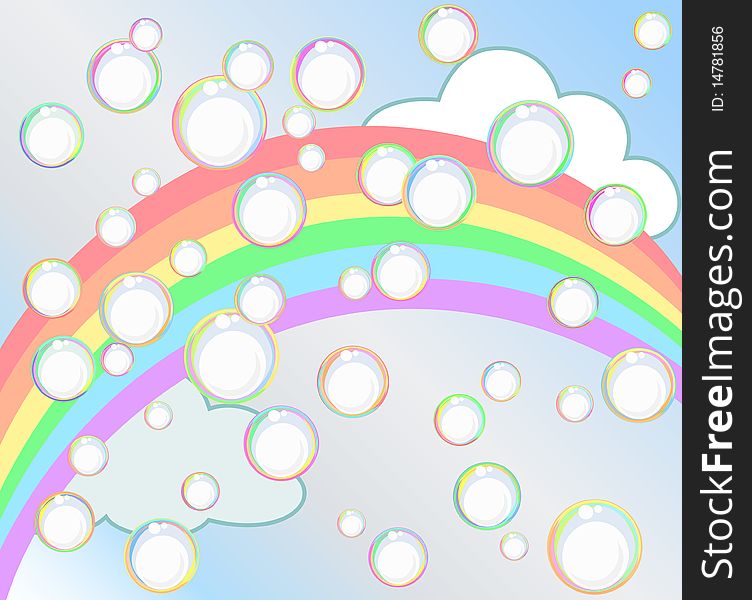 Soap bubbles against the blue sky, rainbow and clouds