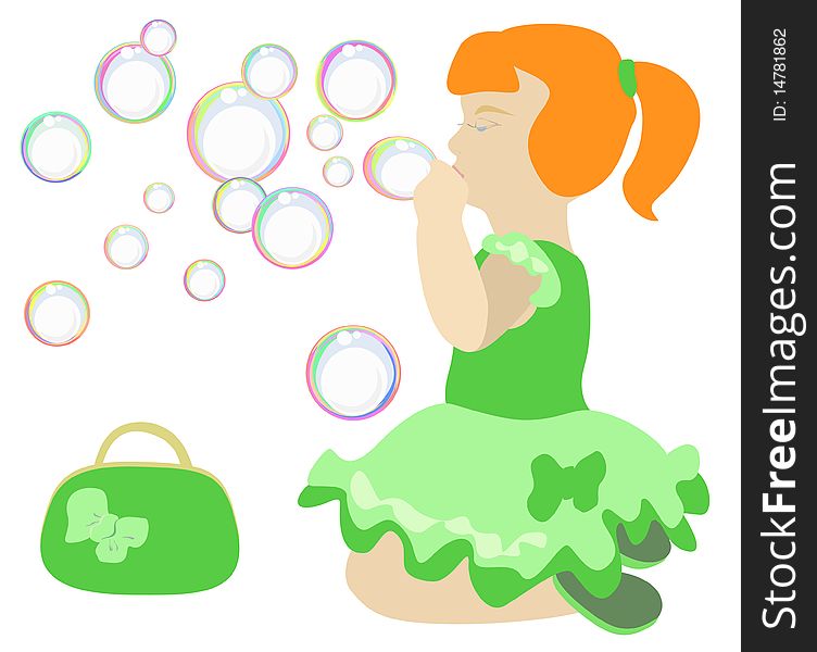 A little girl blowing soap bubbles. A little girl blowing soap bubbles