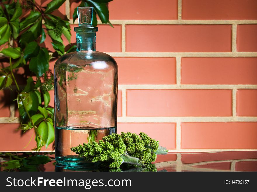 Old Bottle On Brick Wall Background
