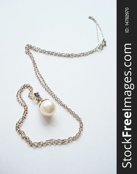 Silver necklet with a manmade pearl. Silver necklet with a manmade pearl