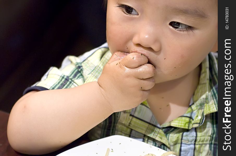 Eating baby to grab pasta