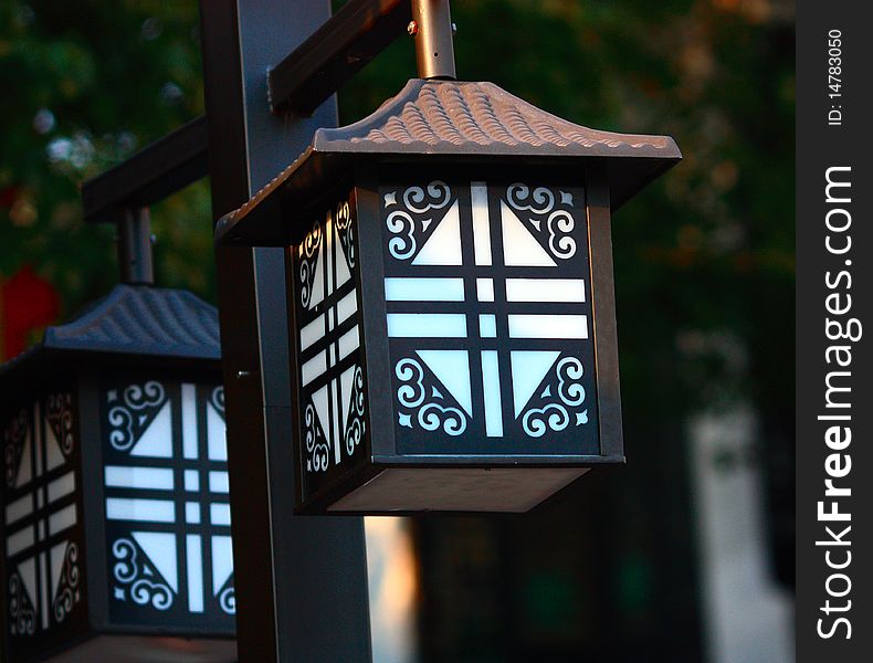 Classical lamppost in the sunset.