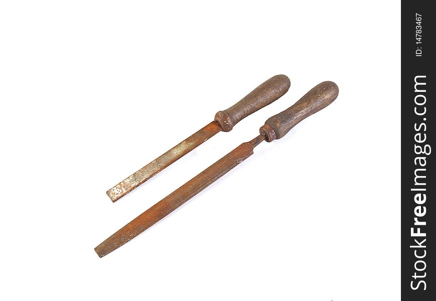 Two old, rusty rasps or files on a plain white background.