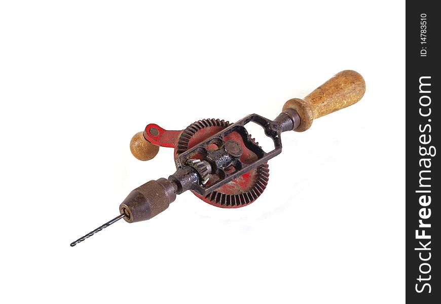 Old hand drill on a plain white background.