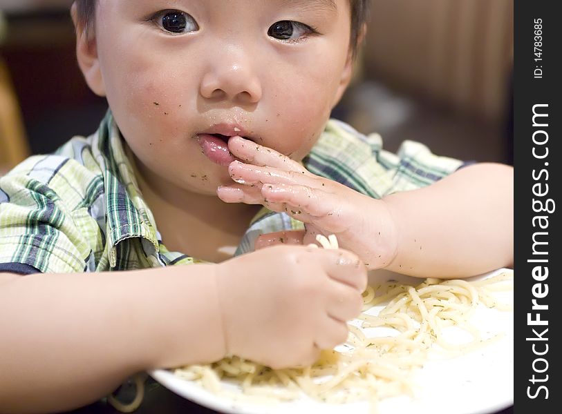 Eating baby to grab pasta