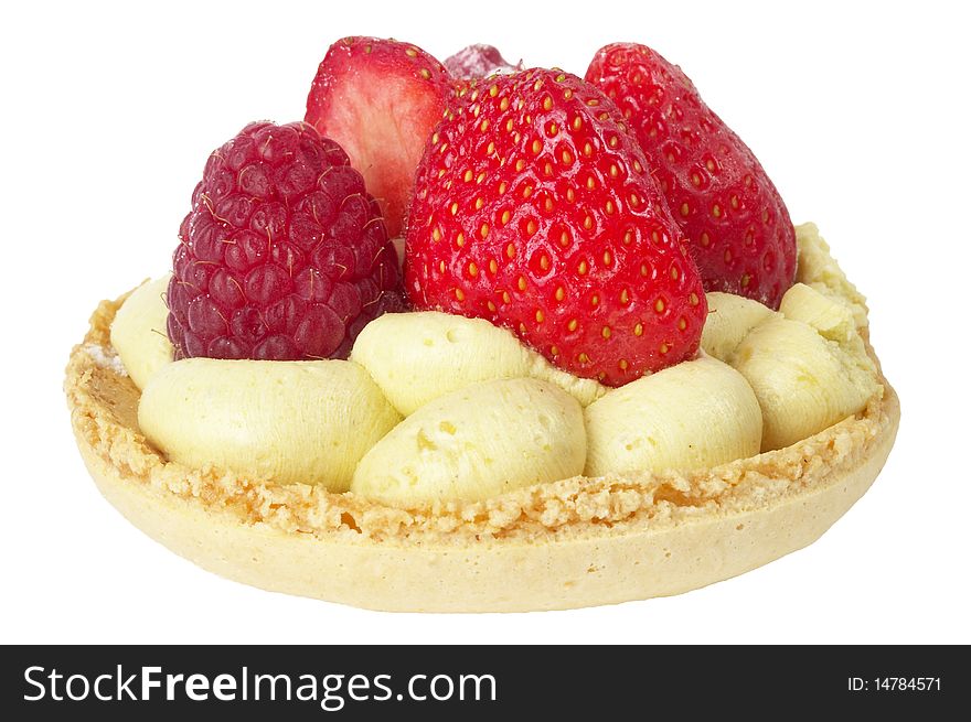 Small berries tart macro shot isolated over white background