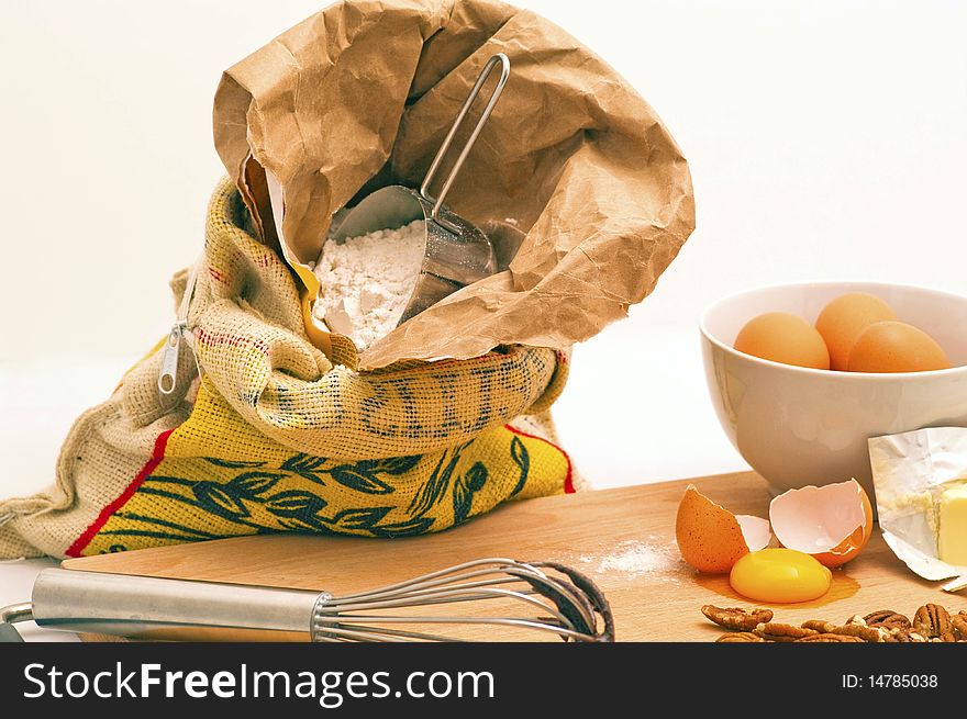 Baking with fresh ingredients like flout, butter and eggs.