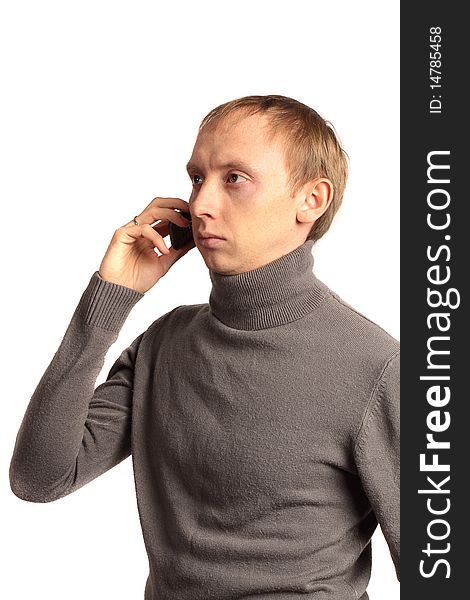 Confident strong man call on the phone and looking sideways isolated on a white background