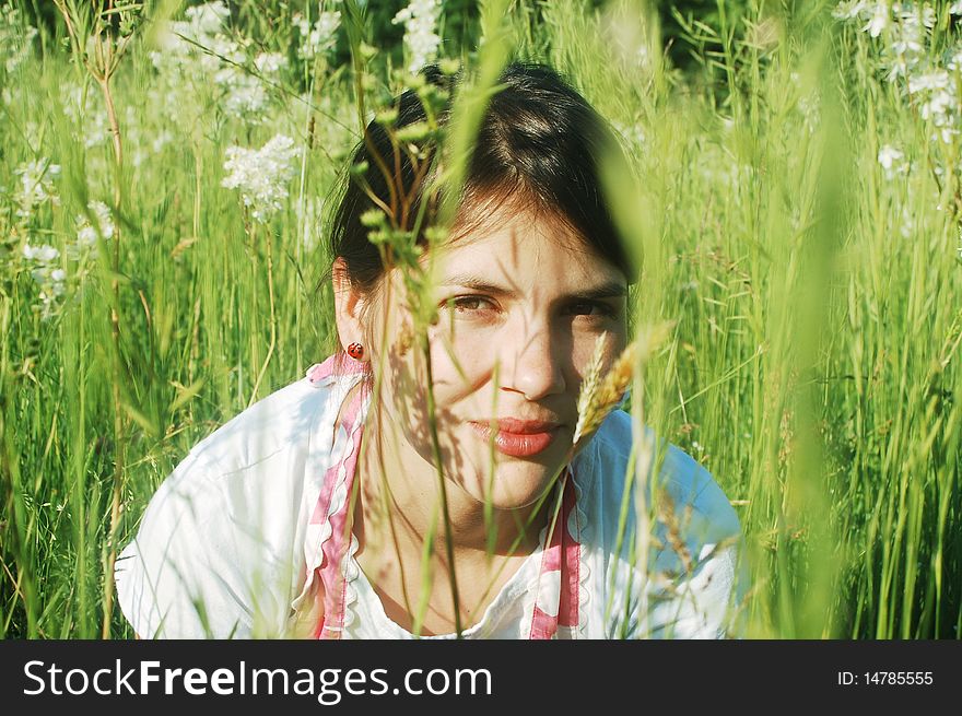 Young Girl In Summer Meadow
