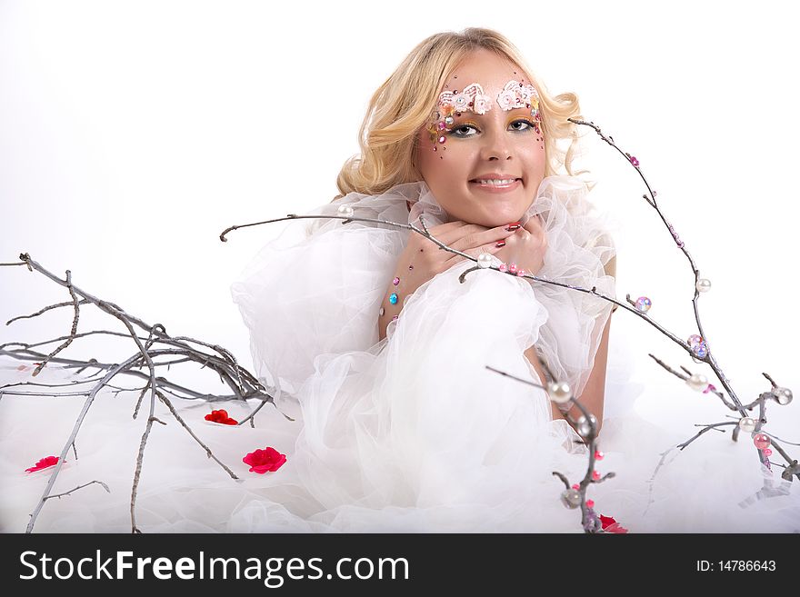 Beautiful fairy girl with tree branch