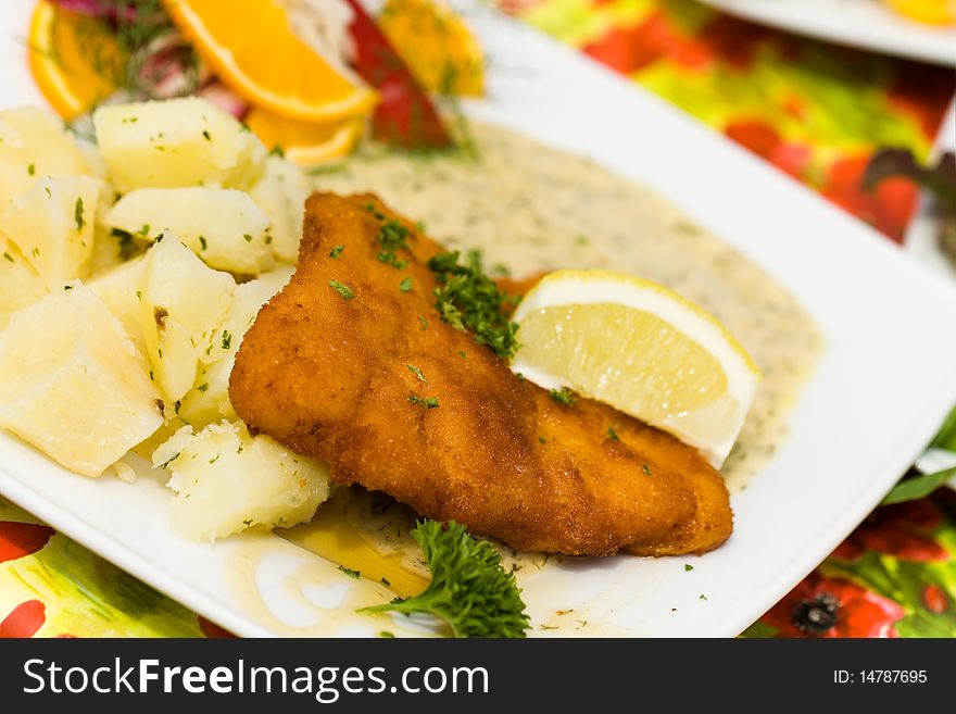 Meal,Deep fried fresh Cod Fish with Potato and Sauce