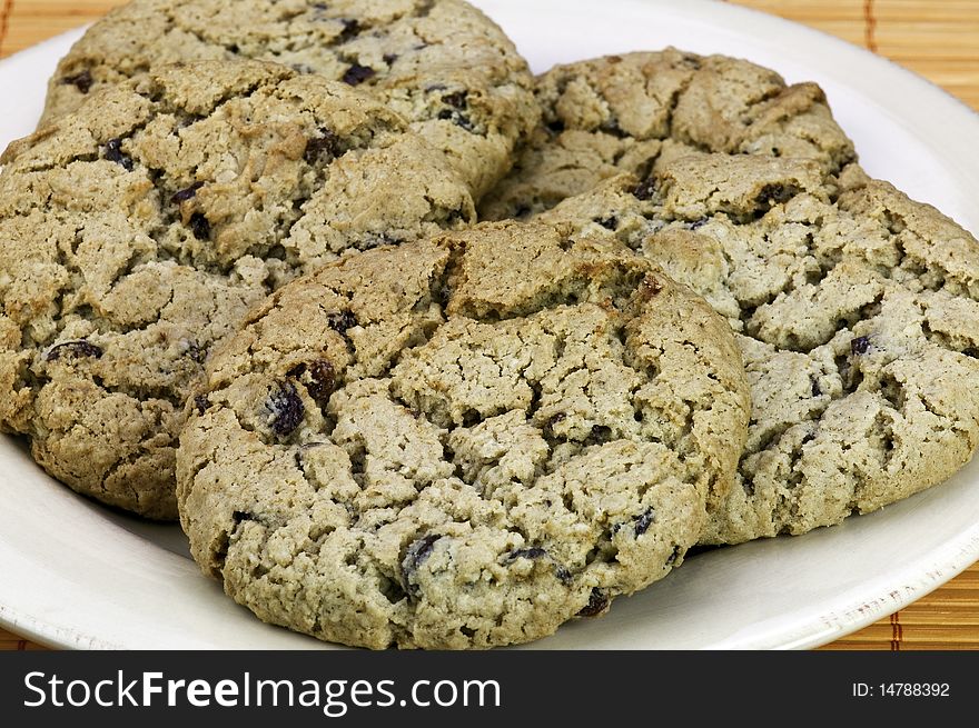 Fresh oatmeal raisin cookies on a plate