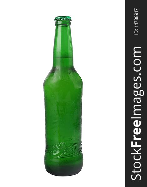 A bottle of beer is slanted with white background