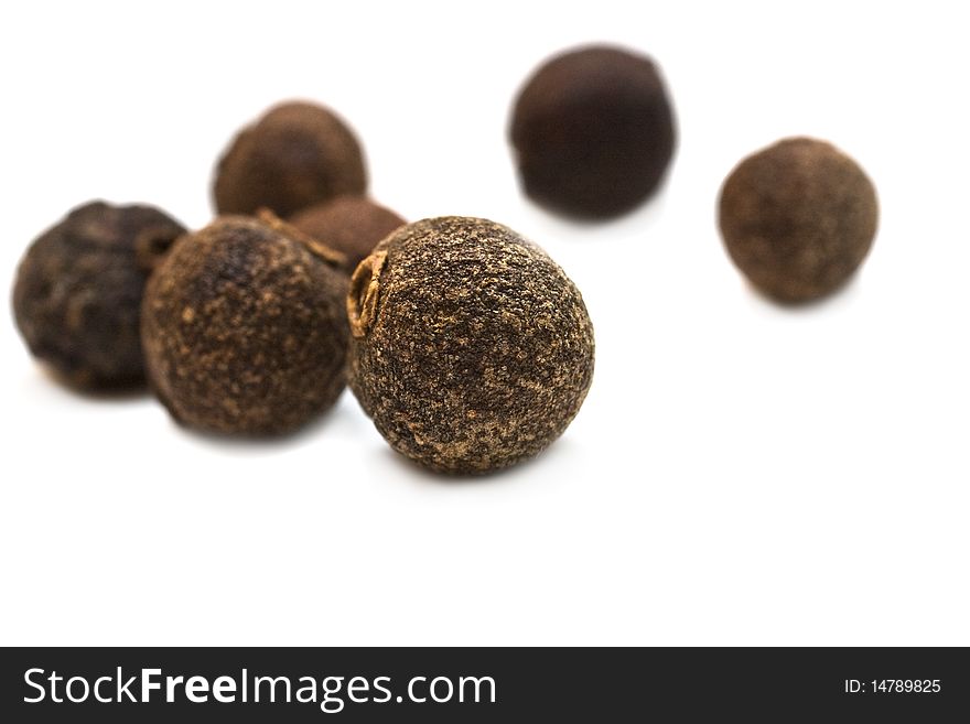 Closeup of peppercorns isolated on white background. Closeup of peppercorns isolated on white background