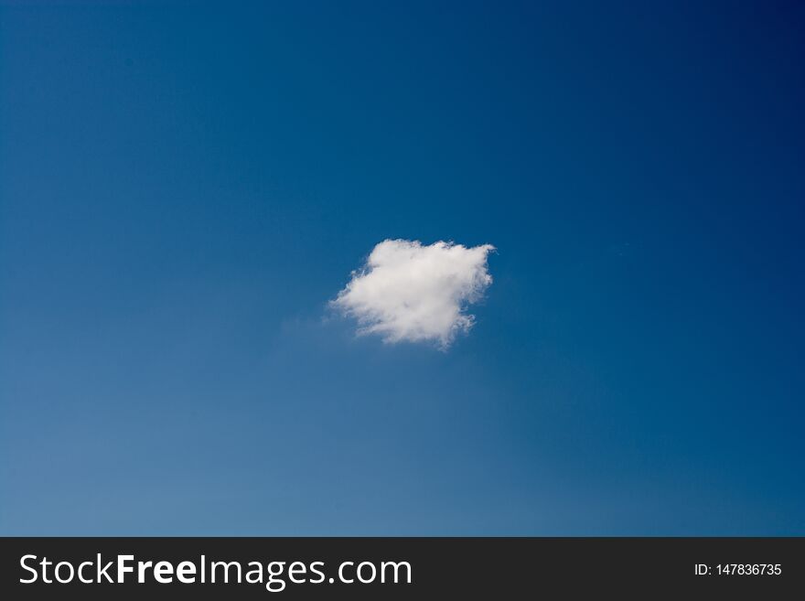 Sky with white  and blue clouds