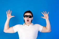 Surprised A Guy With Glasses In The Studio Stock Photo Surprised A Guy With Glasses In The Studio Stock Photo