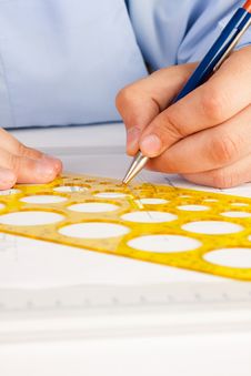 Architect Working On Architectural Plans Royalty Free Stock Images