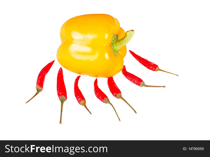 Yellow paprika with red chily isolated on white