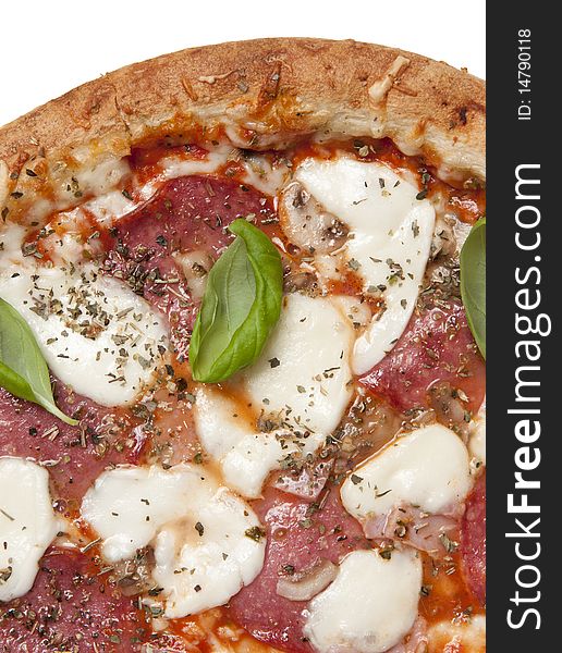 Pizza speciale with salami, ham, basil and mozzarella cheese. Pizza speciale with salami, ham, basil and mozzarella cheese