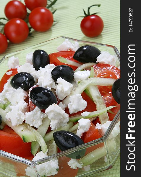 Delicious Greek salad with red cherry tomato olives and feta cheese