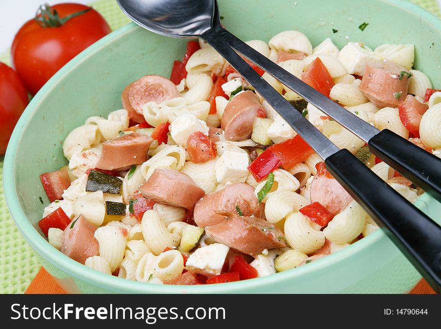 Delicious pasta salad with paprika and frankfurter sausage