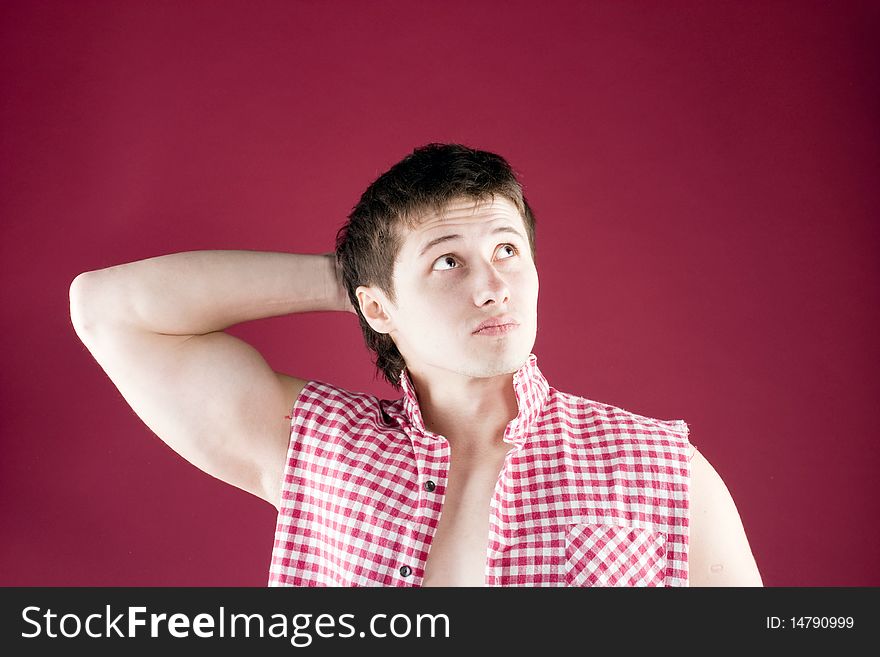 Young Casual Man Portrait, Isolated On Red