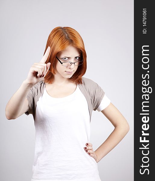 Young businesswomen in white with glasses.