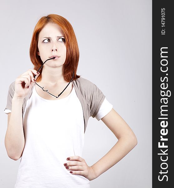 Young businesswomen in white with glasses.