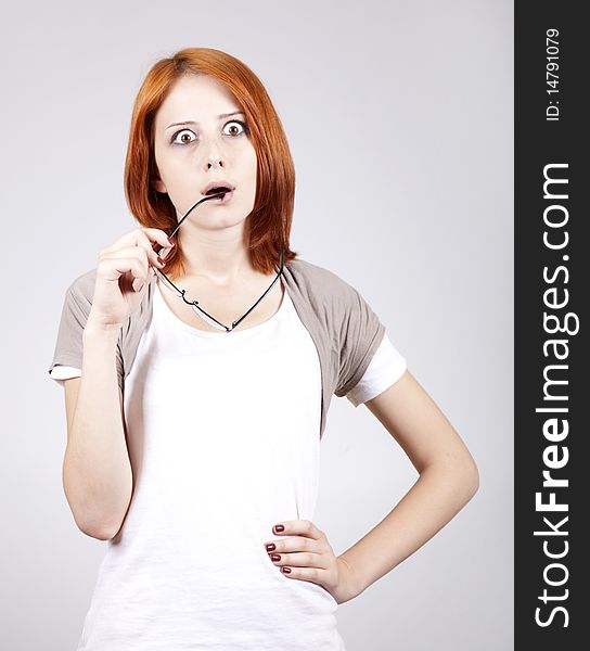 Young businesswomen in white with glasses.