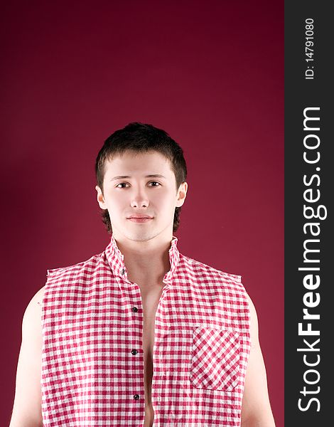 Happy Young Casual Man Portrait, Isolated On Red