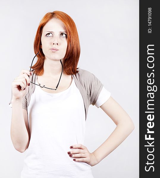 Young Businesswomen in white with tie and glasses