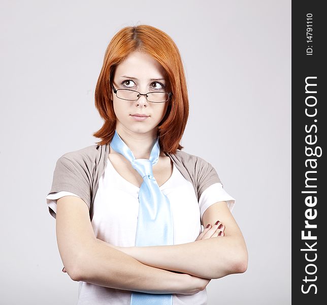 Young Businesswomen in white with tie and glasses