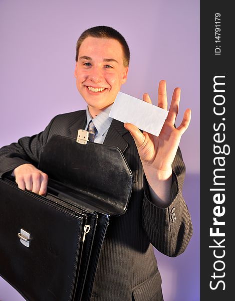 In the picture a young man in a navy business card shows where you can put any content. In the picture a young man in a navy business card shows where you can put any content.