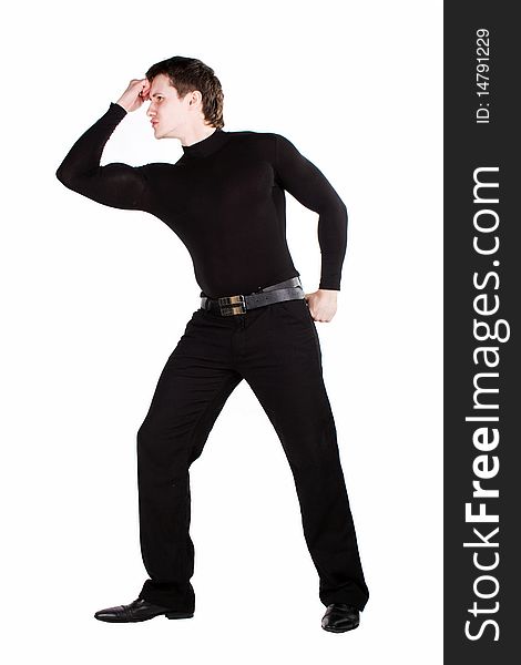 Confident guy dressed in black on a white background. Confident guy dressed in black on a white background