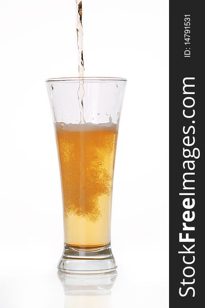 Glass of beer close-up with froth