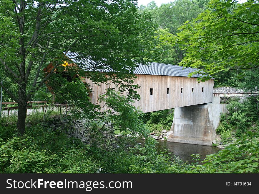 A single span covered bridge is almost hidden in the Vermont countryside.  They are a part of Vermont's heritage and visited by traveler's from all over the world. A single span covered bridge is almost hidden in the Vermont countryside.  They are a part of Vermont's heritage and visited by traveler's from all over the world.