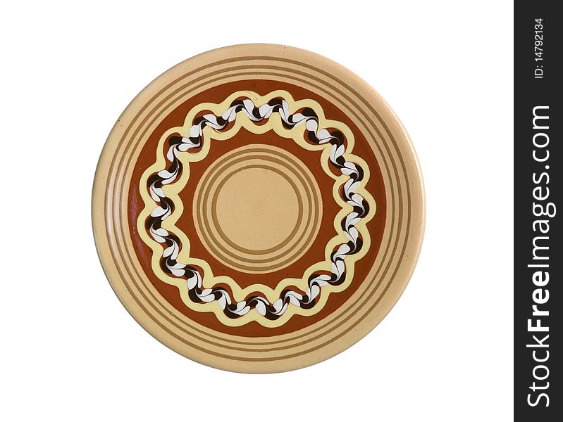 Dish with a decorative pattern on a white background. Dish with a decorative pattern on a white background