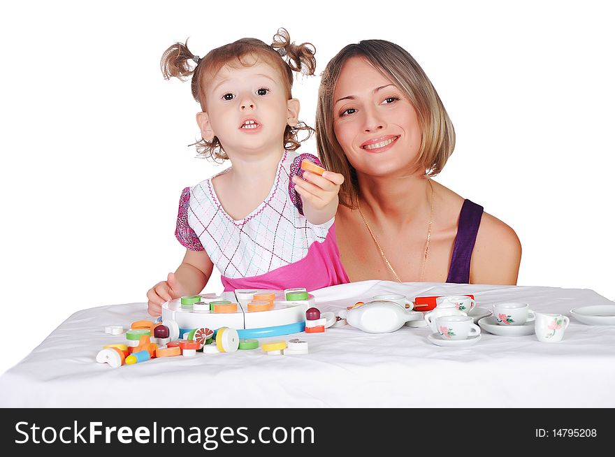 Mom and her little daughter together engaged in crafts. Mom and her little daughter together engaged in crafts