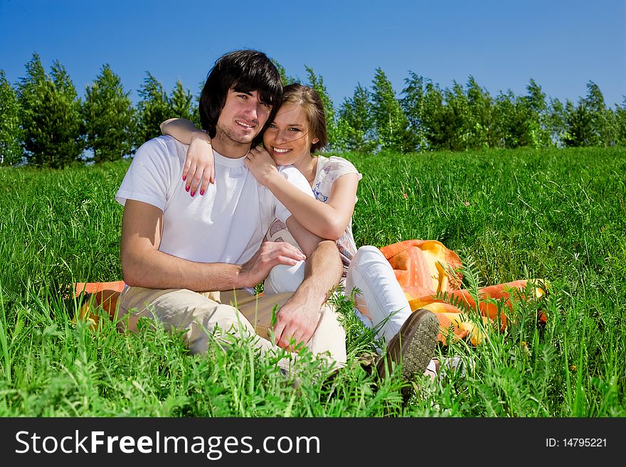 Boy and beautiful girl on grass. Boy and beautiful girl on grass
