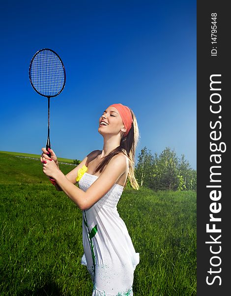 Girl In White Dress With Racket
