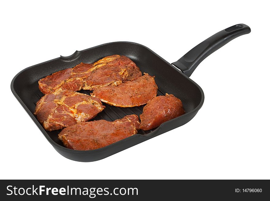 Frying pan with meat to the barbecue