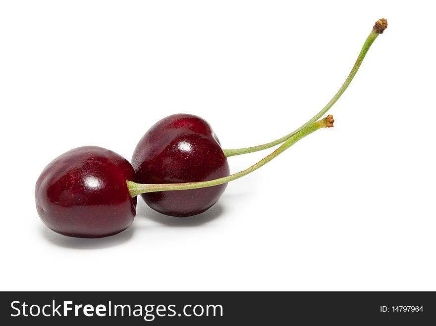 Two cherries are located on the diagonal. Isolated. Two cherries are located on the diagonal. Isolated.