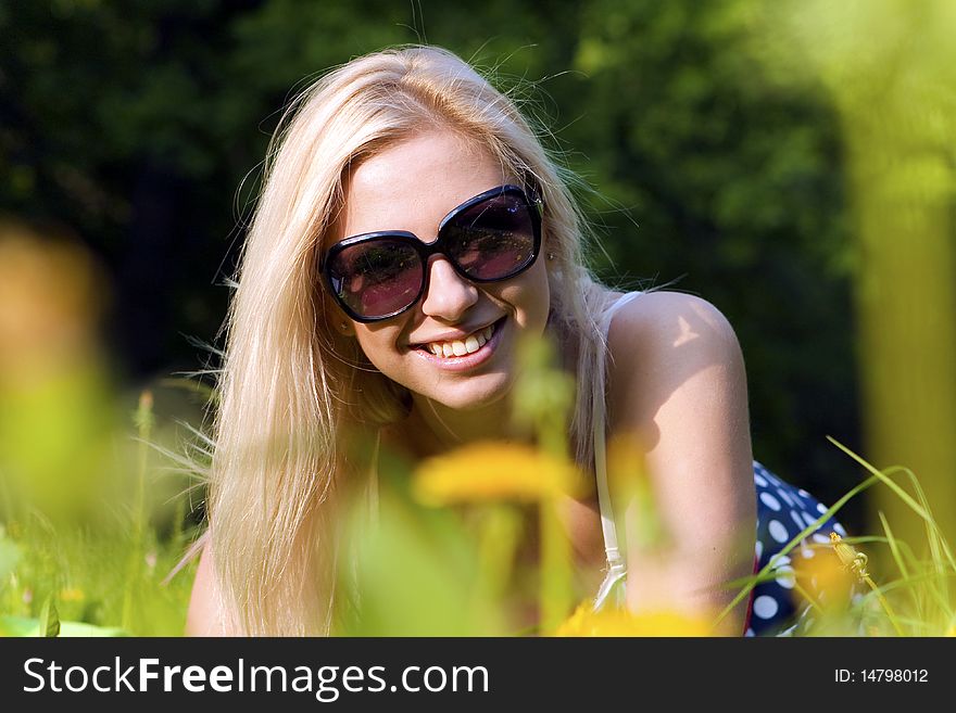 Attractive slim blonde in absenteeism in the park
