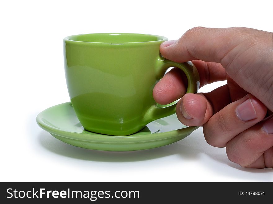 A cup of green on a white background. Isolated.
