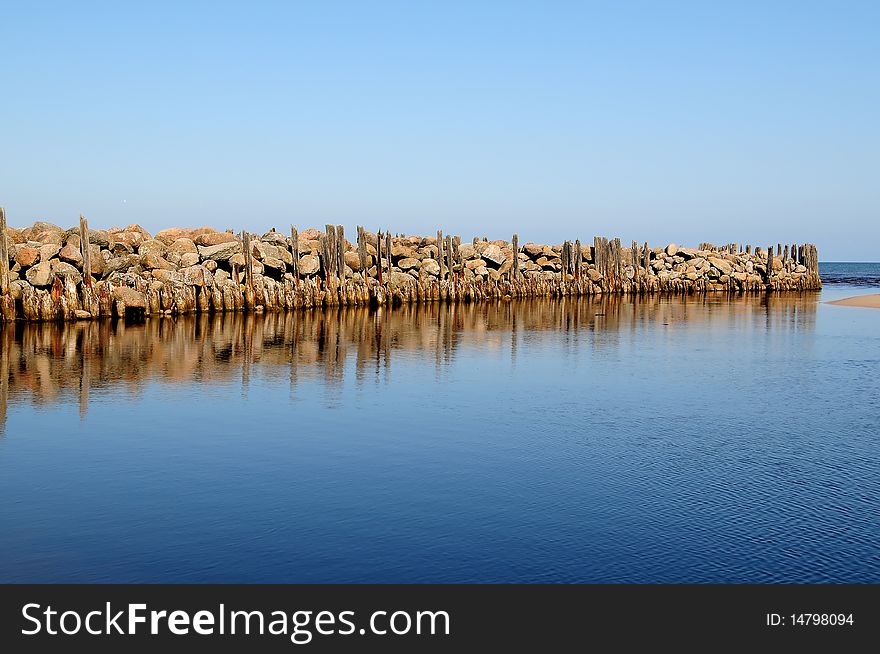 Old stone pier in the Baltic sea. Old stone pier in the Baltic sea