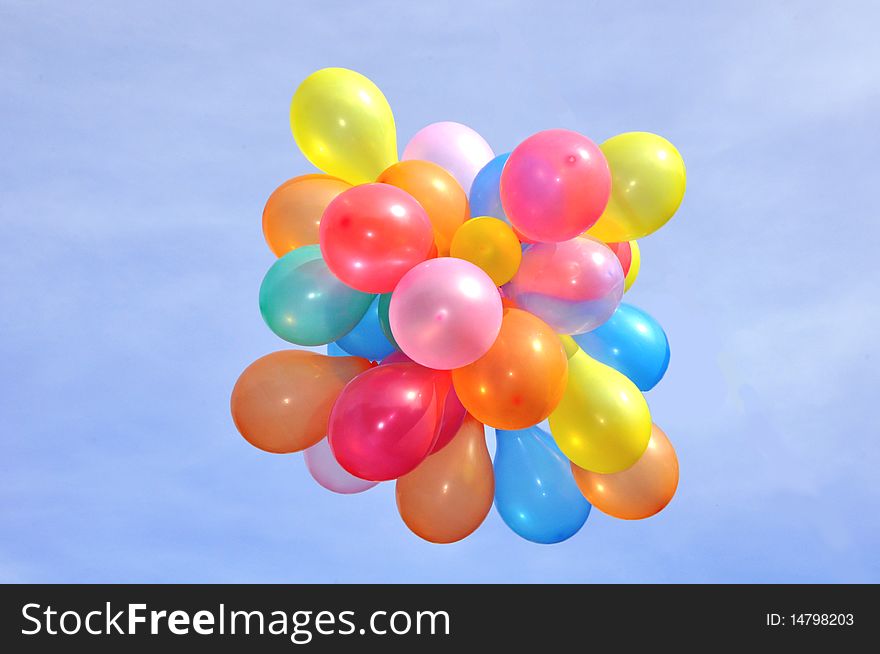 Groups of colored balloons fly to heaven. Groups of colored balloons fly to heaven