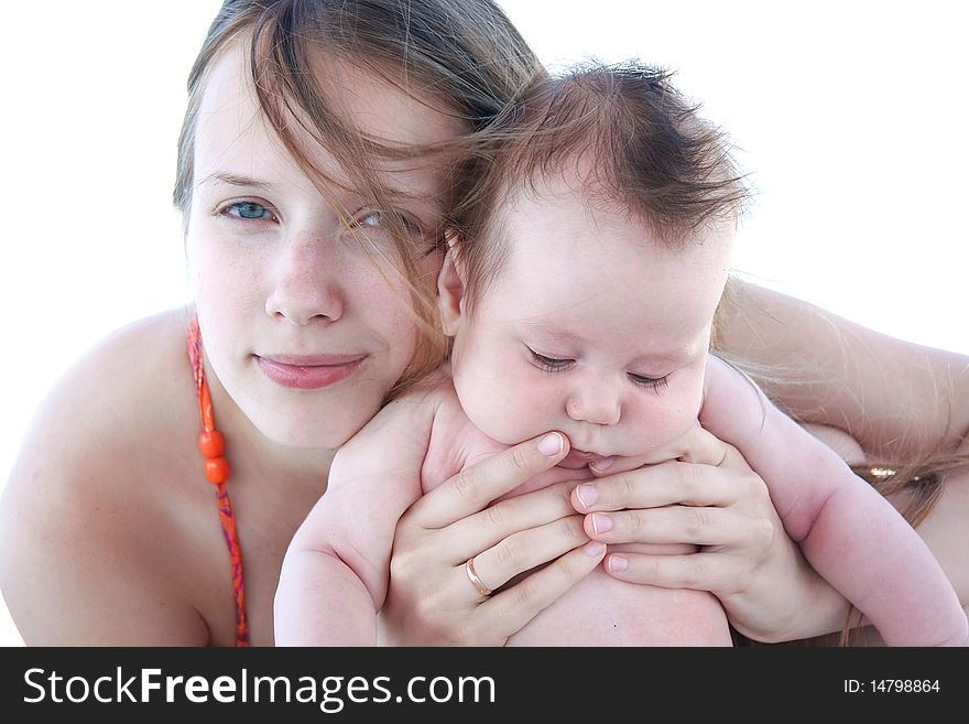 Isolated portrait of young mother and baby