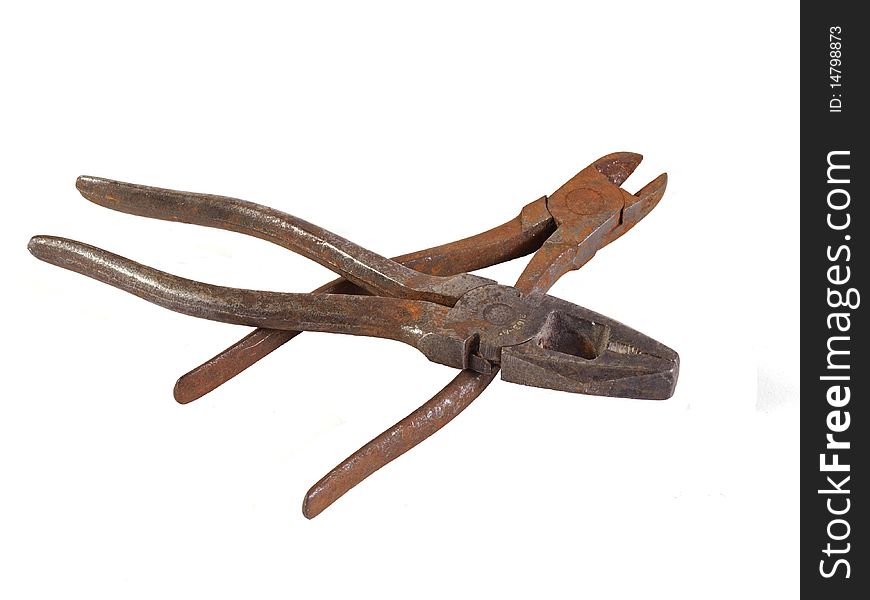 Old rusty pliers on a plain white background