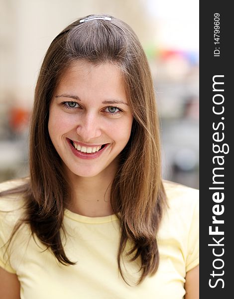 Portrait of young happy smiling woman