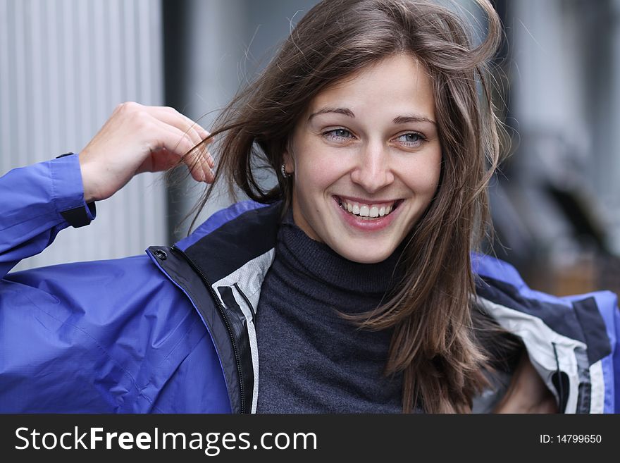 Closeup - happy young woman smiling